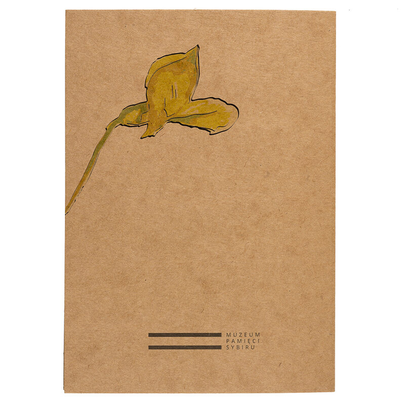 Zdjęcie: Na białym tle tył okładki notesu. Na niej narysowany kwiat akacji. Na dole logo Muzeum Pamięci Sybiru.