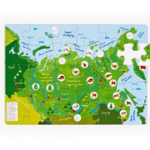 Zdjęcie: Na białym tle ułożone puzzle "przyroda Syberii". W prawym, górnym rogu jeden puzzel został wyjęty i ułożony obok układanki. Puzzle przedstawiają mapę Syberii narysowaną przez Darię Solak. Na mapie zaznaczono dwadzieścia trzy punkty. Są to niewielkie, białe kropki, a w każdej z nich jedno zwierzę lub roślina charakterystyczna dla oznaczonego regionu Syberii. Na przykład: piżmowiec syberyjski, burunduk, piesiec czy też jodła syberyjska.